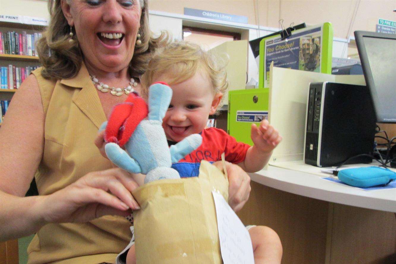 Someone's happy... little Jacob lost Iggle at the teddy bear's picnic during the Hythe Festival on July 1