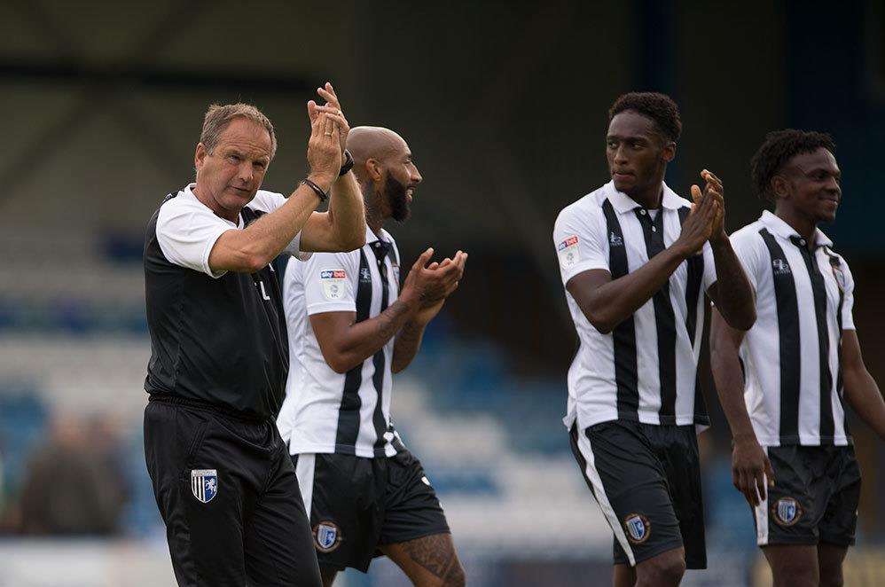 Gillingham boss Steve Lovell thanks the fans after the 3-1 win over Burton Albion Picture: Ady Kerry