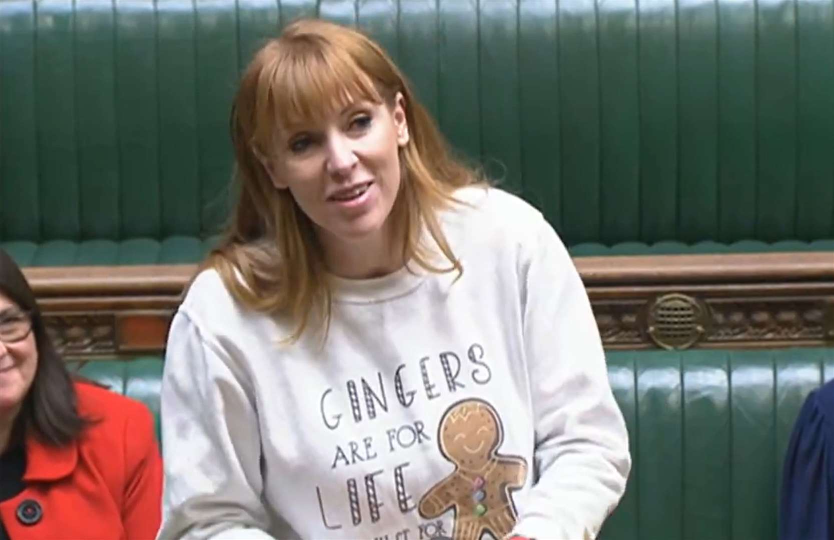 Labour deputy leader Angela Rayner speaking in the House of Commons, wearing a Christmas jumper featuring a picture of a gingerbread man and the words ‘Gingers are for life not just for Christmas’ (House of Commons/PA)