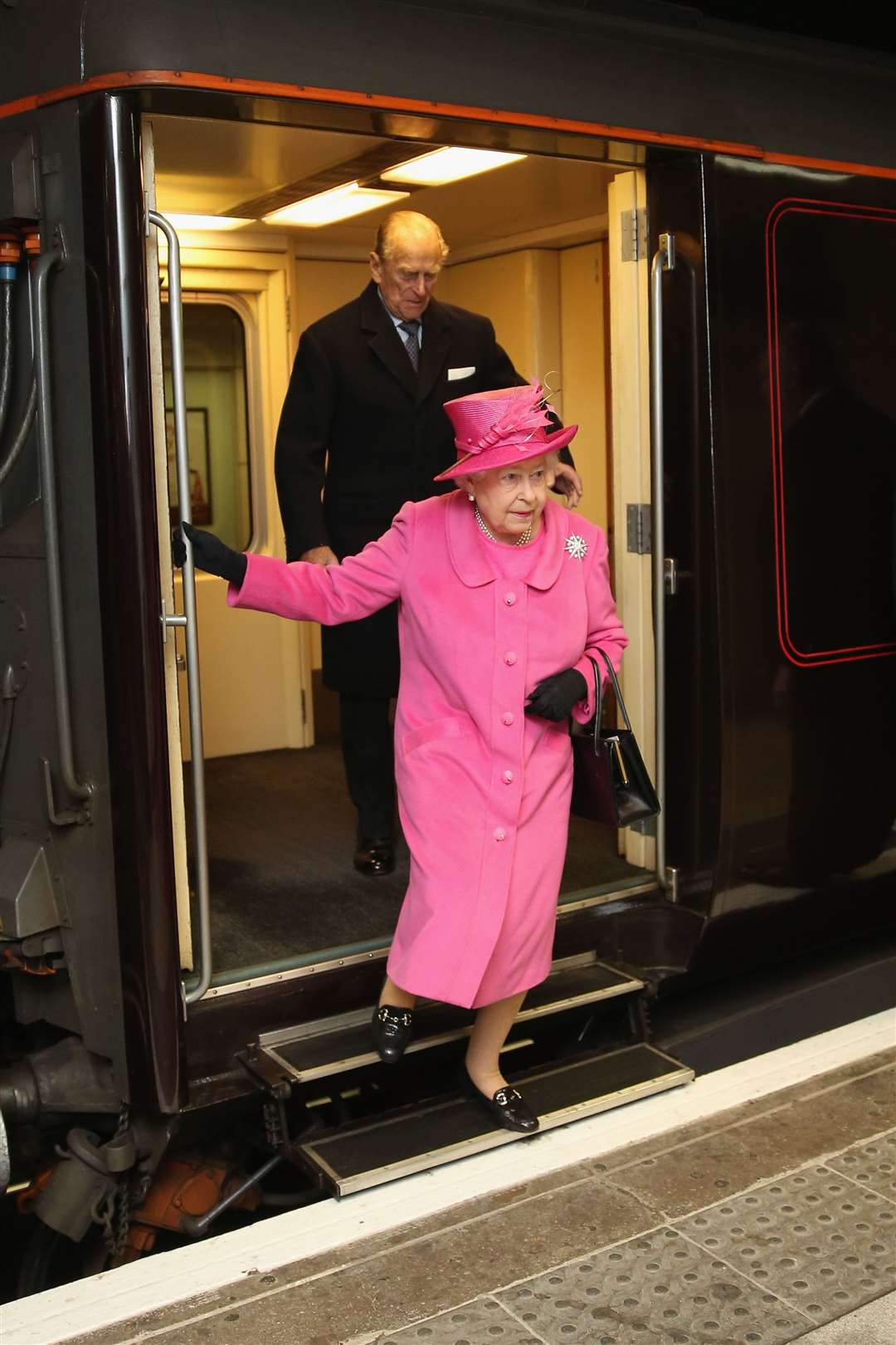 The Queen and Duke of Edinburgh arrive at Birmingham New Street Station on the Royal Train in 2015 (Christopher Furlong/PA)