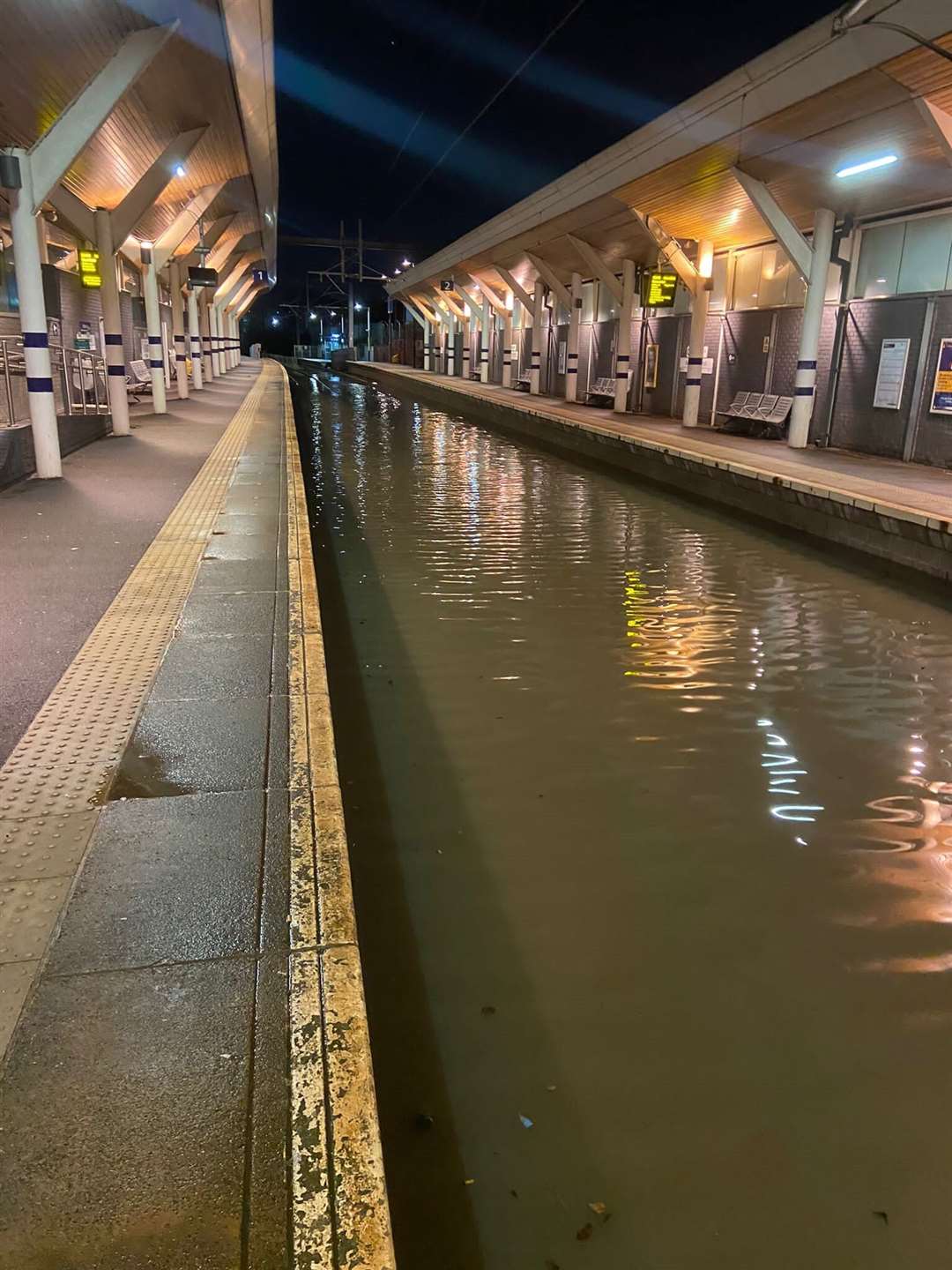 The tracks at Rotherham station lie under water (Network Rail/PA)