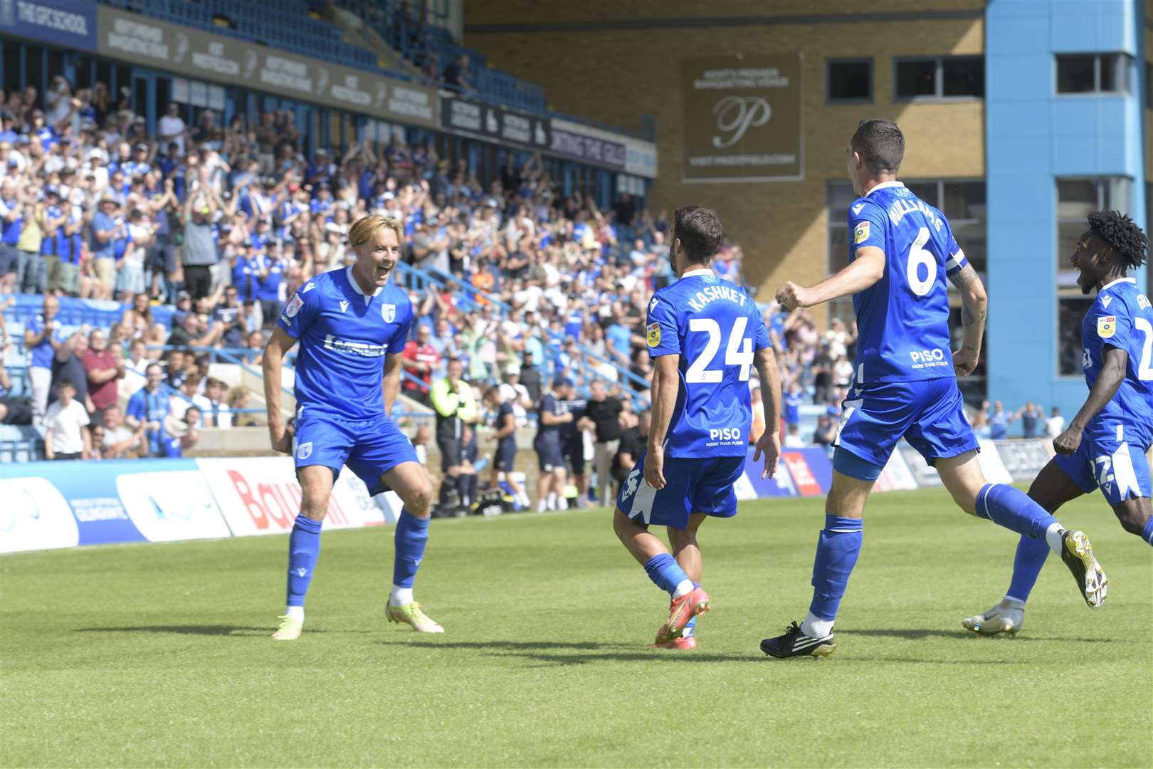 Gillingham players celebrate their goal, scored by Scott Kashket from Will Wright's free-kick Picture: Barry Goodwin