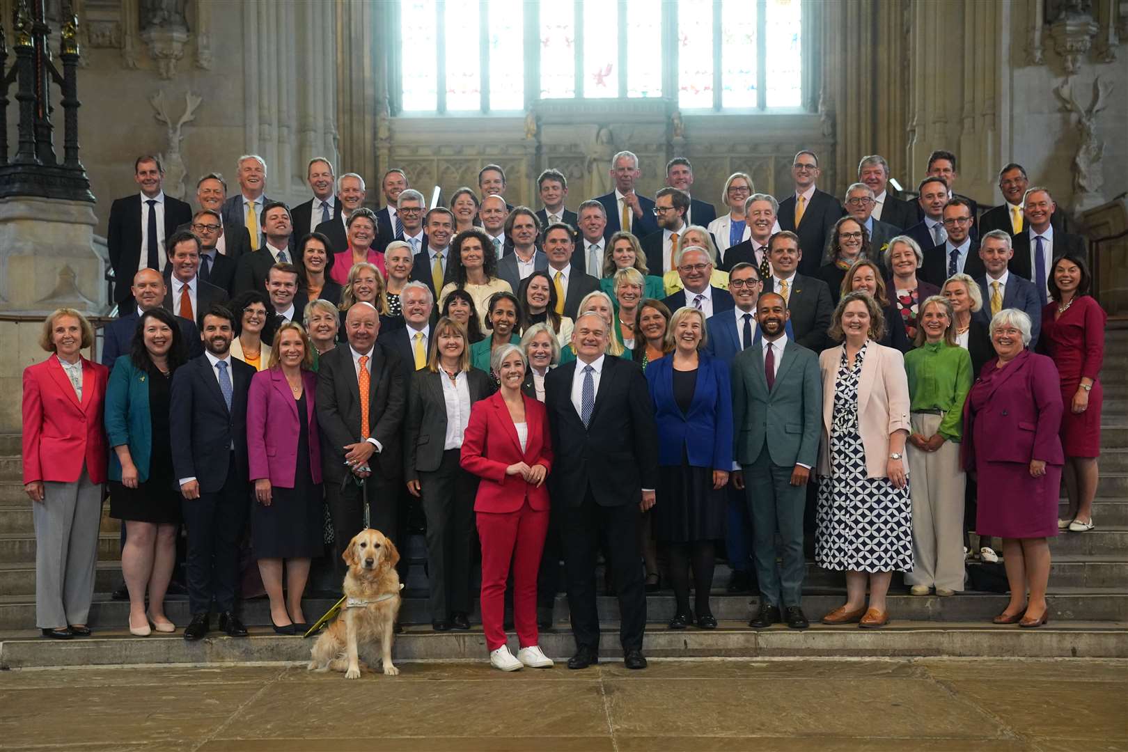 Liberal Democrat leader Sir Ed Davey with the party’s 72 MPs (Lucy North/PA)