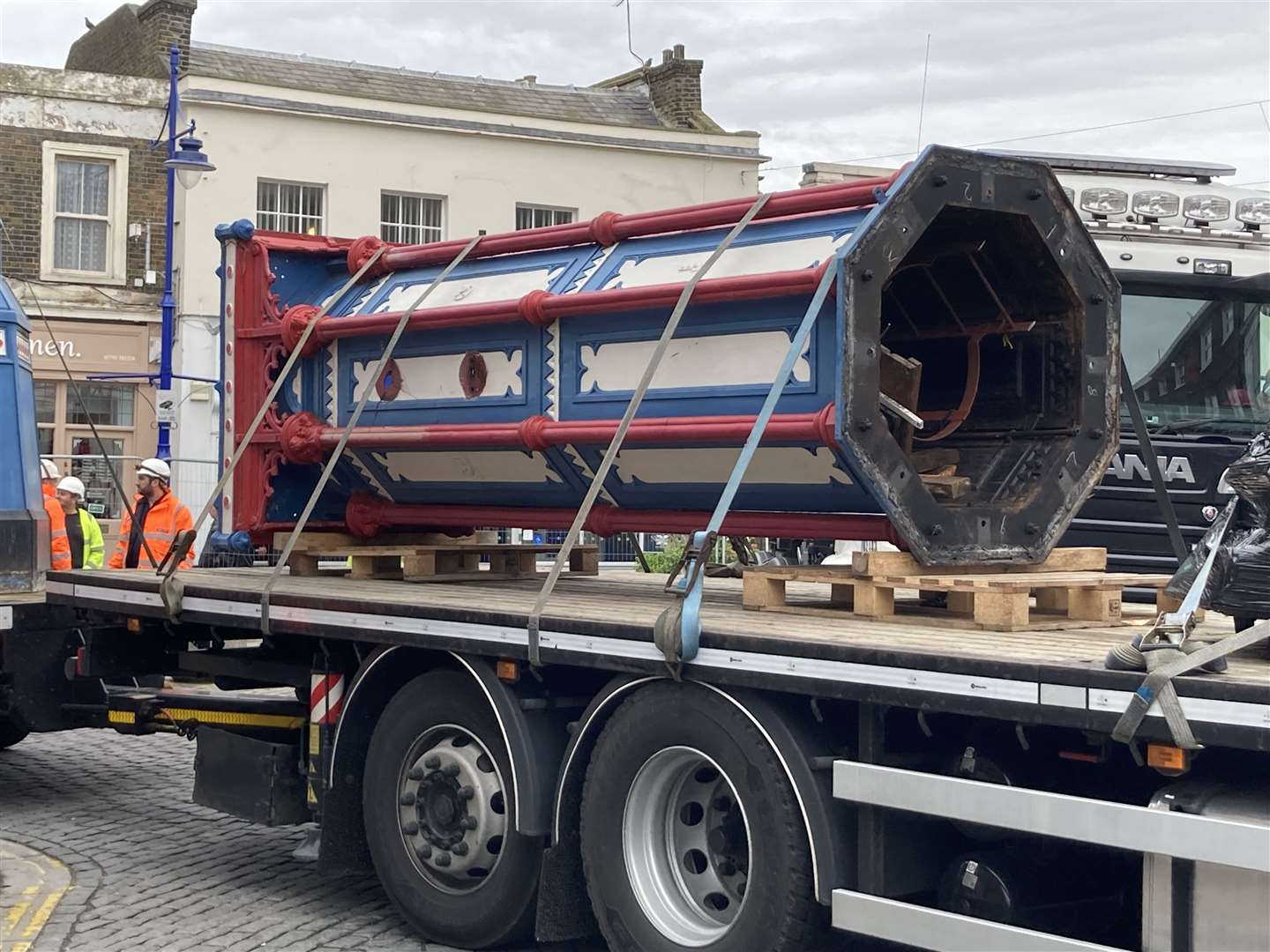 Bye: the clock tower is taken away for refurbishment. Picture: John Nurden