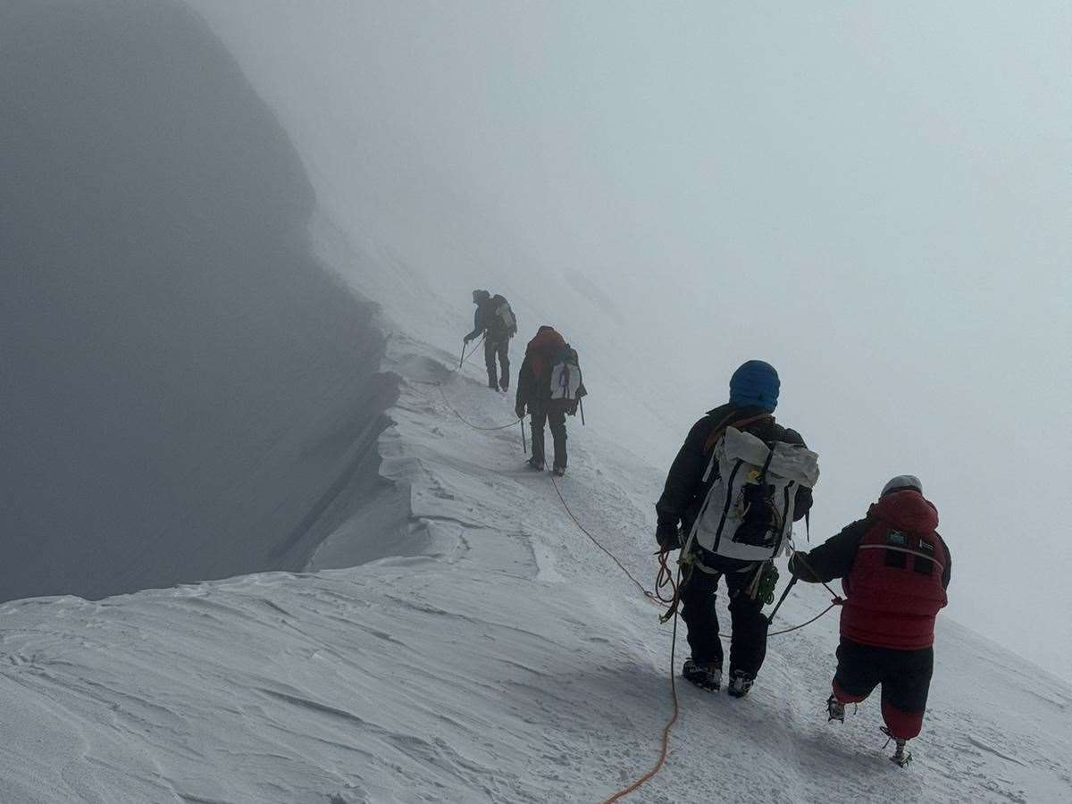 The team had to cope with high winds at higher altitude, which slowed their progress, delayed their final push for the summit and risked supplies running dangerously low