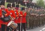 Sappers march along Dock Road, led by the Band of the Royal Engineers