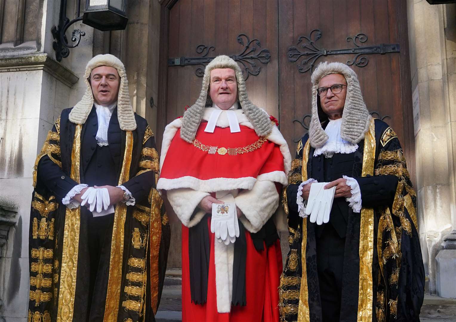 From left, Justice Secretary Brandon Lewis, alongside Lord Chief Justice Lord Burnett and Master of the Rolls Sir Geoffrey Vos, at the Royal Courts of Justice, in central London, ahead of his swearing in ceremony as Lord Chancellor (Yui Mok/PA)