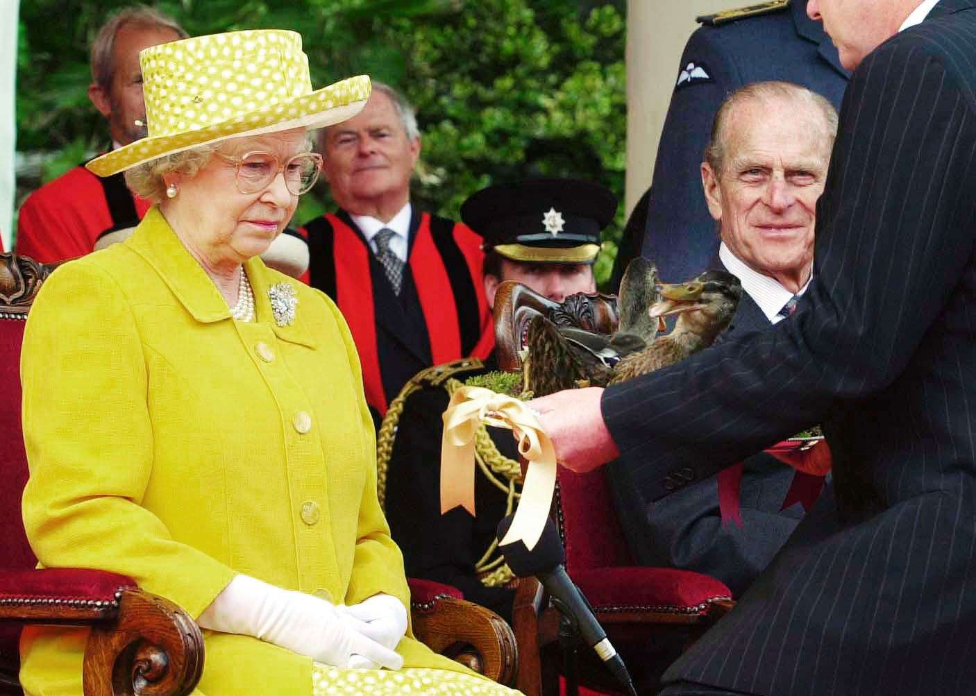 The former Queen with Steve Morgan, seigneur of the Parish of Trinity, on Jersey in 2001 (Fiona Hanson/PA)