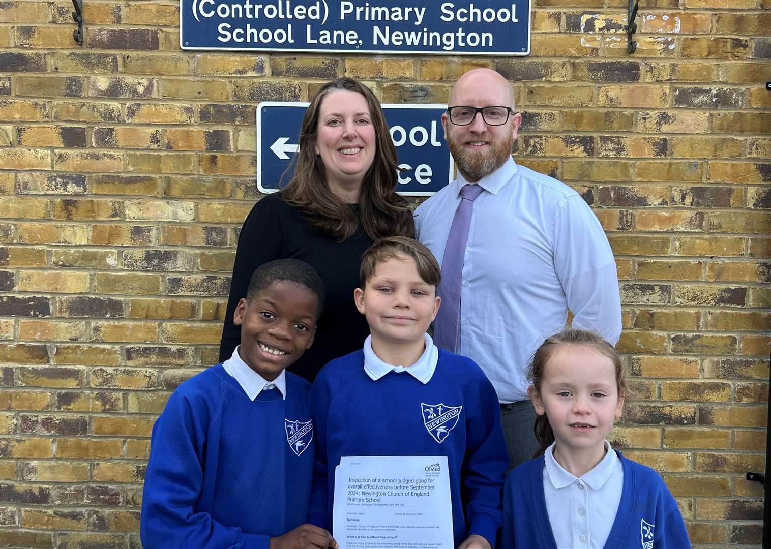 Executive head teacher Tara Deevoy and head of school, Simon Krafft, celebrate with pupils. Picture: Newington CEP School