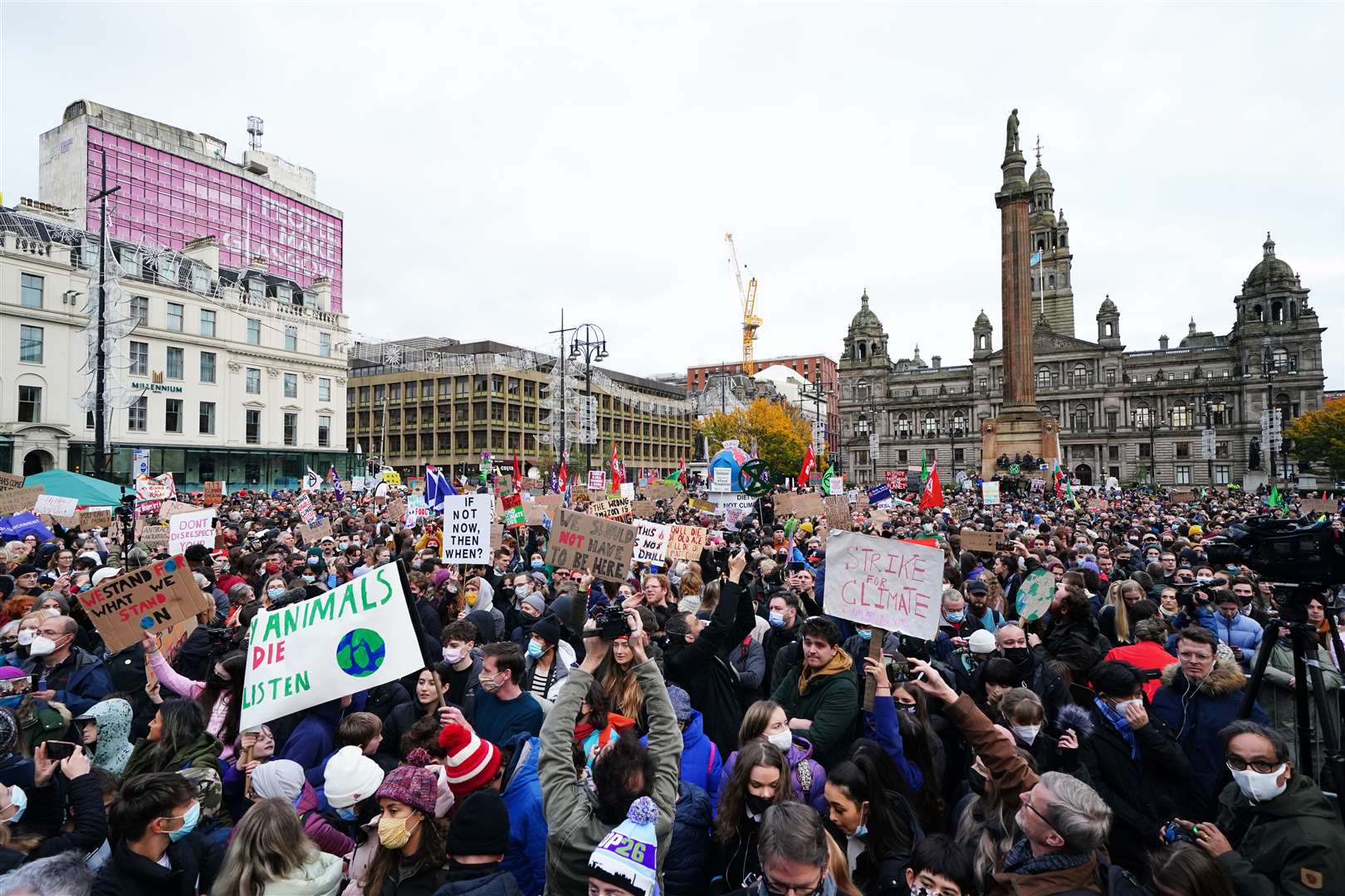 Demonstrators in George Square take part in the Fridays for Future Scotland march (Jane Barlow/PA)