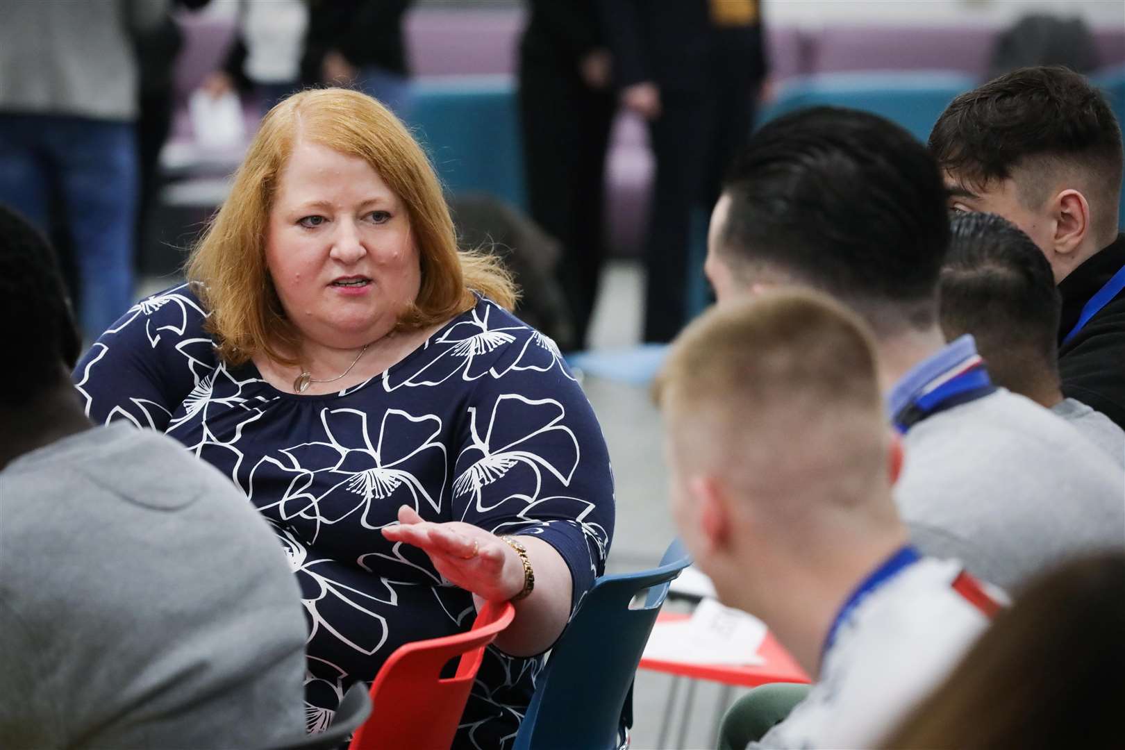 Naomi Long during a visit to Hydebank Wood (Kelvin Boyes/Press Eye/PA)