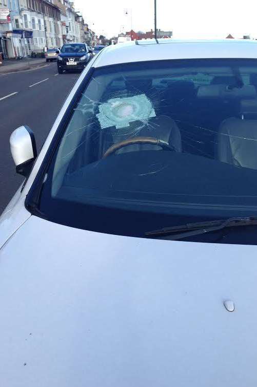 Thomas & Partners' Jaguar with a smashed windscreen on the Strand in Walmer.