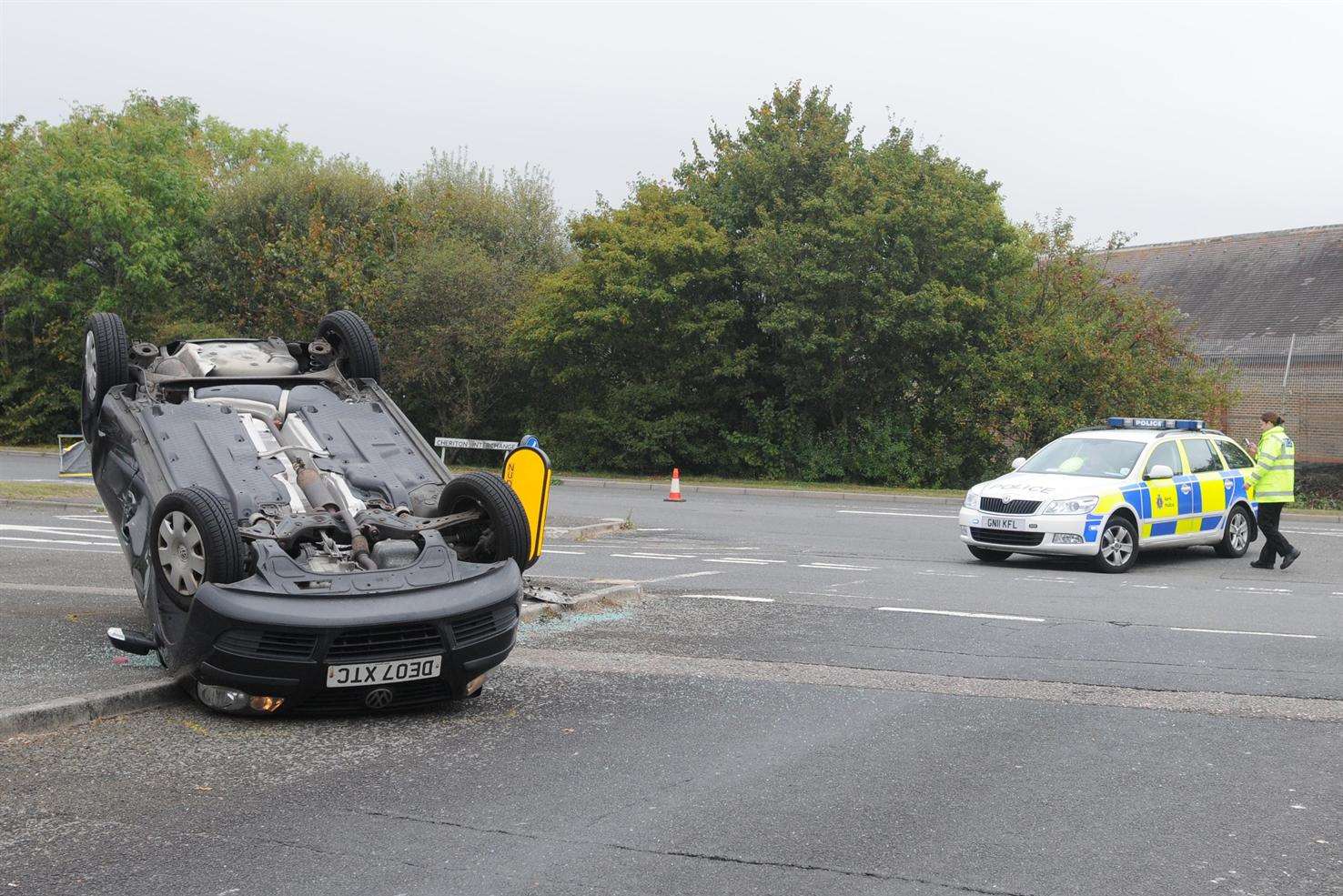 The car flipped over onto its roof