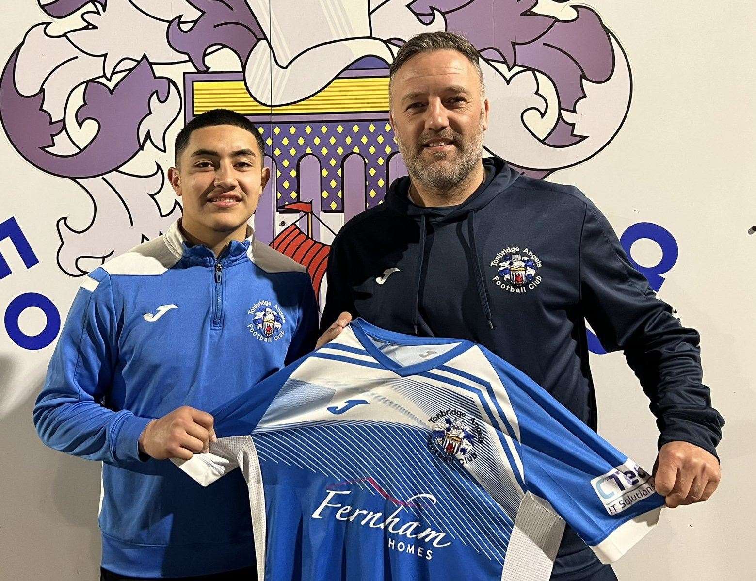 Jay Saunders welcomes Jeremy Santos back to Tonbridge. Picture: TAFC