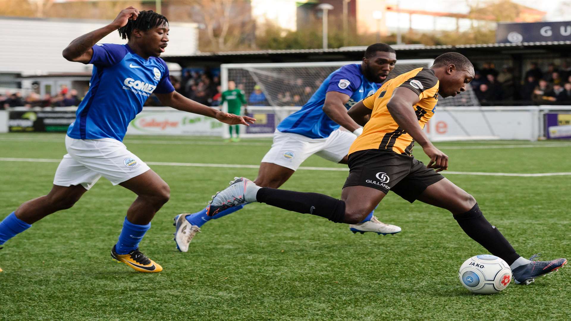 Jamar Loza is tracked by Kadell Daniel and Femi Ilesanmi Picture: Andy Payton