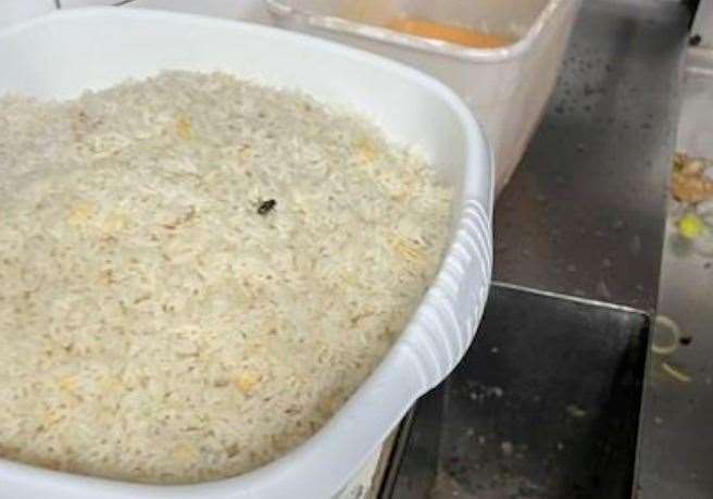 A fly landed on cooked egg-fried rice during the inspection at Ho Ho Chinese in Folkestone