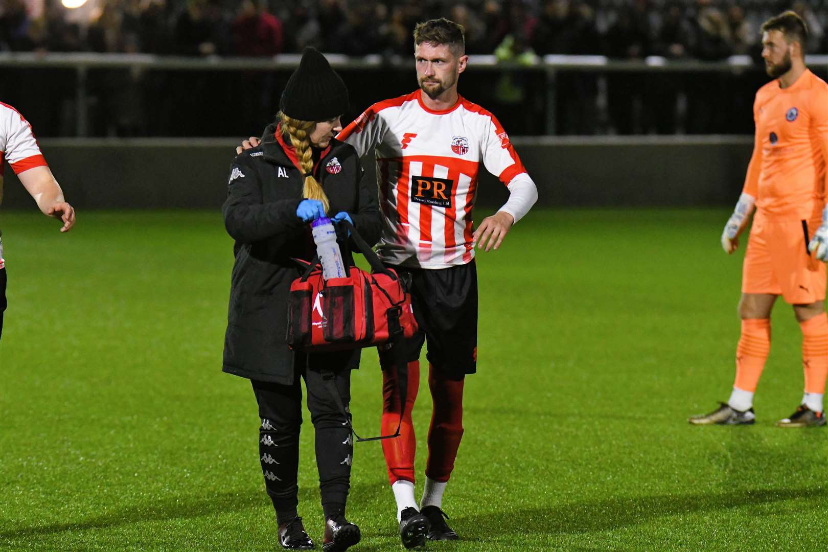 Dan Bradshaw is forced off injured against Billericay. He’s been battling to get fit for Friday night’s FA Cup First Round tie Picture: Marc Richards