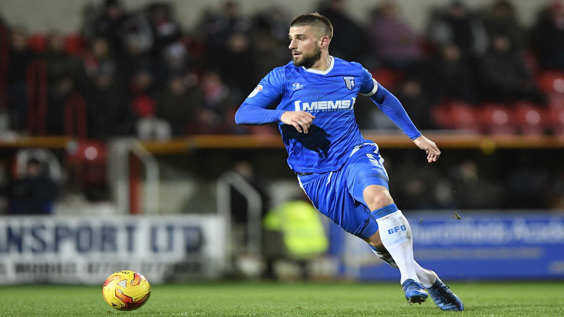 Max Ehmer carries the ball out of defence Picture: Ady Kerry