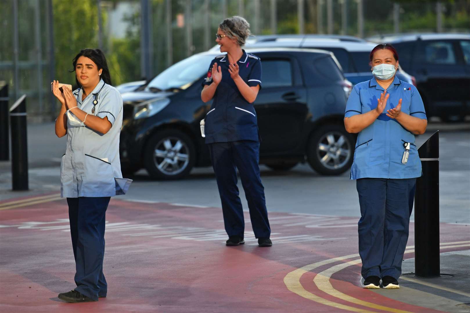 Staff gather at Queen Elizabeth Hospital in Birmingham (Jacob King/PA)