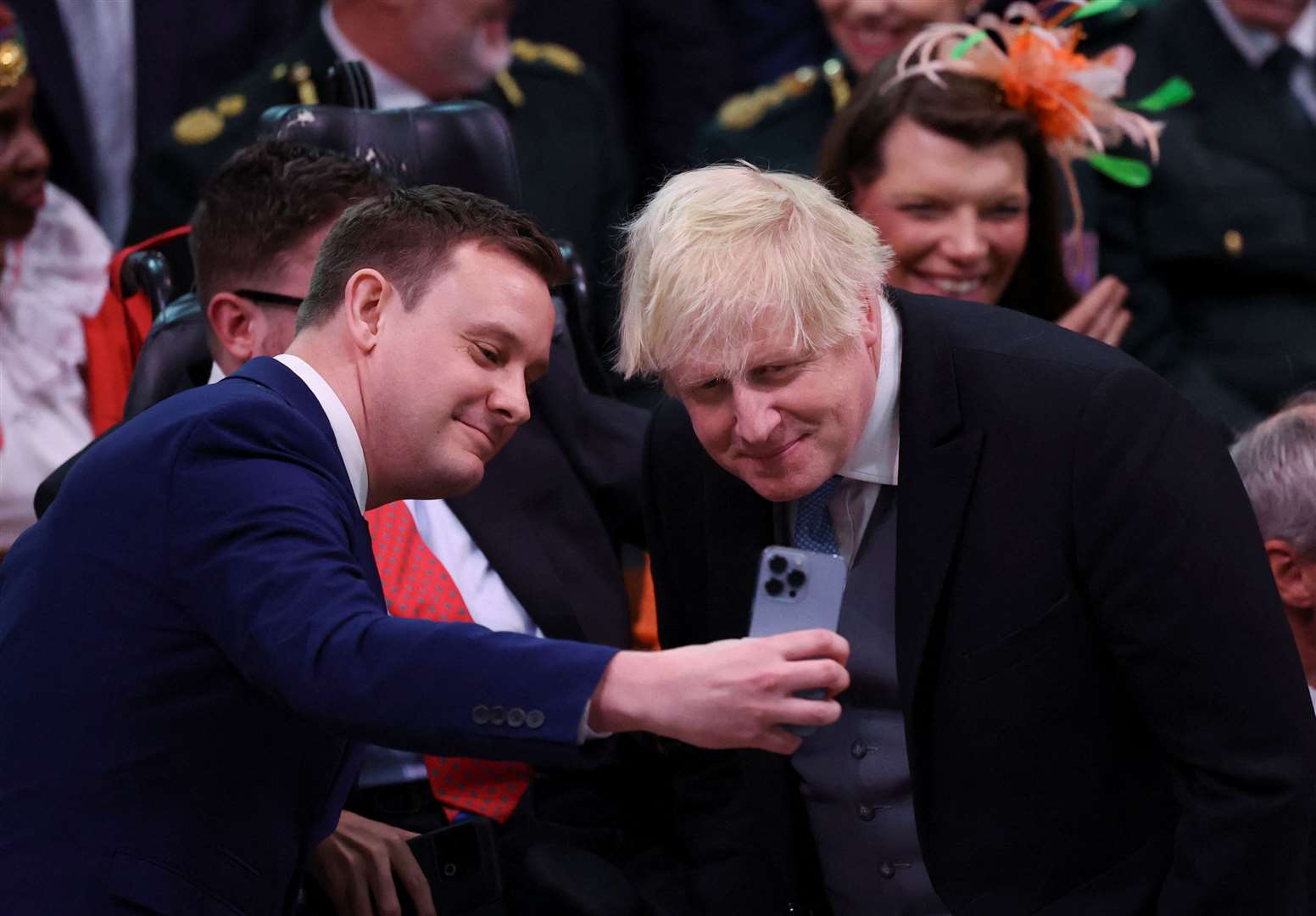 Former prime minister Boris Johnson departs following the coronation of the King (Phil Noble/PA)