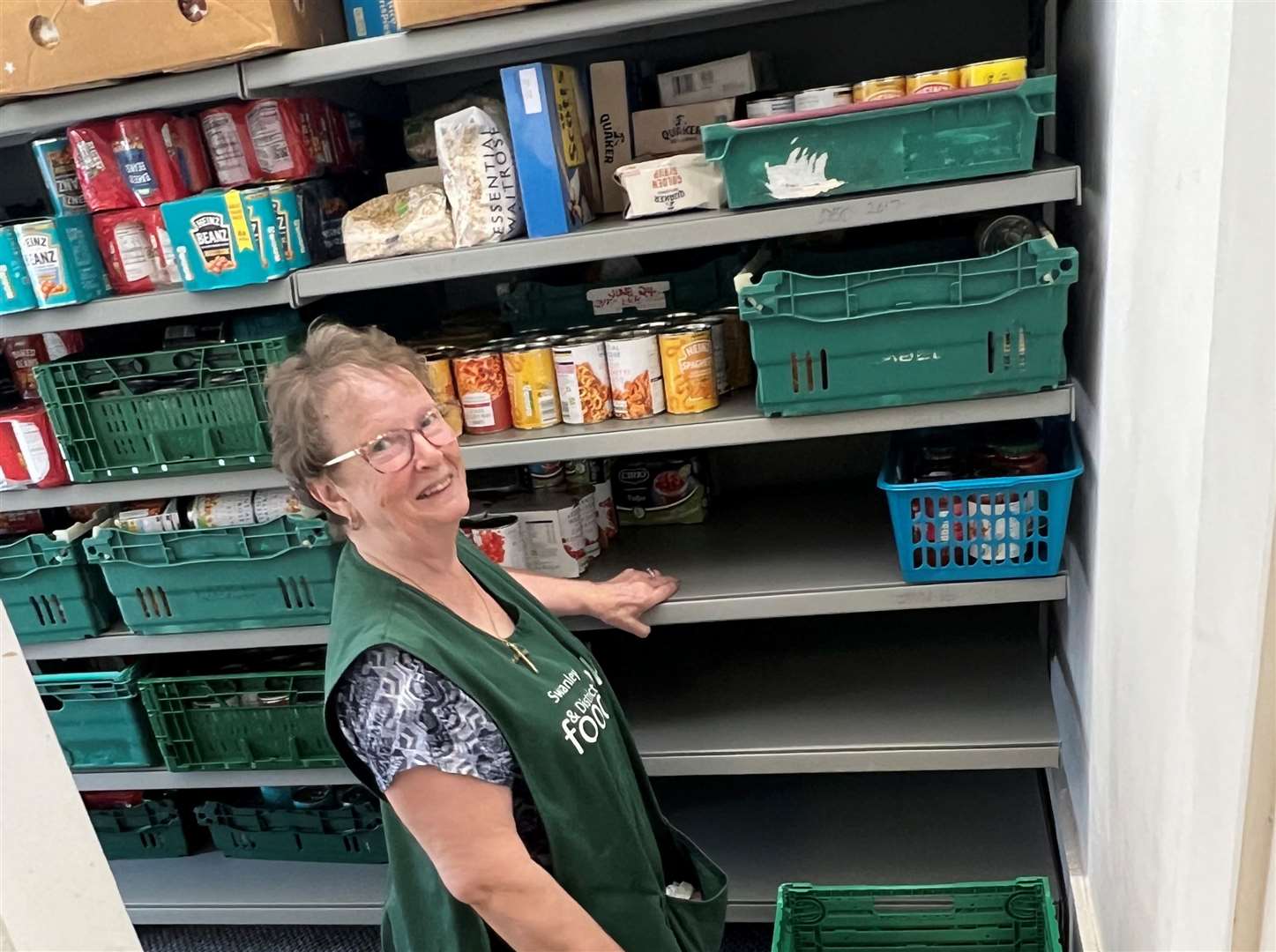 A volunteer at Swanley and District Foodbank's new location in the high street