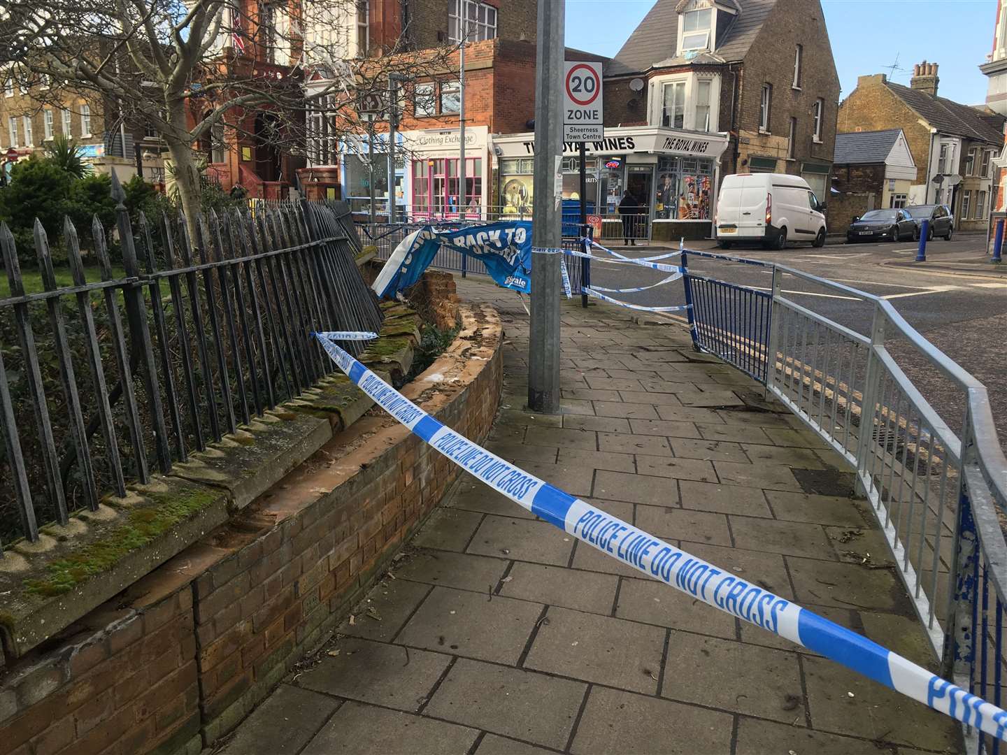 Part of the wall and railings surrounding Holy Trinity Church was demolished when a car crashed at the junction of Sheerness Broadway and Trinity Road on Wednesday night