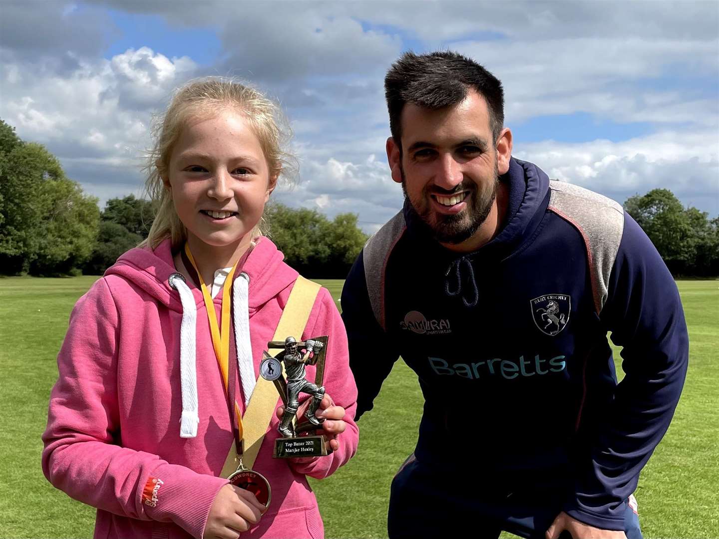 Cowdrey CC - Girls Star Batter Marijke Huxley being presented with her Best Batter award by Kent women's coach David Hathrill