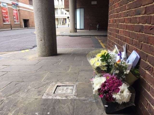 Flowers left by the scene of the attack in Rose Lane