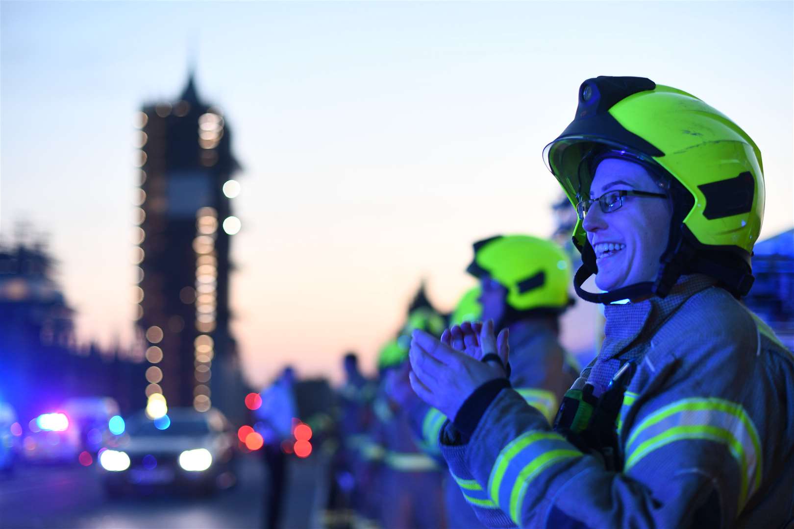 Members of the emergency services lined up on Westminster Bridge in London (Victoria Jones/PA)