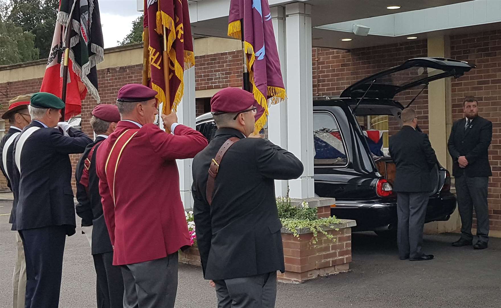 A military send-off was given to Jock Hutton at his funeral today