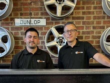 Harry Turner, left, pictured with staff member Rod Moores, who Harry said went "above and beyond" in trying to fight the flames before firefighters arrived. Picture: Sturry Tyres/Harry Turner