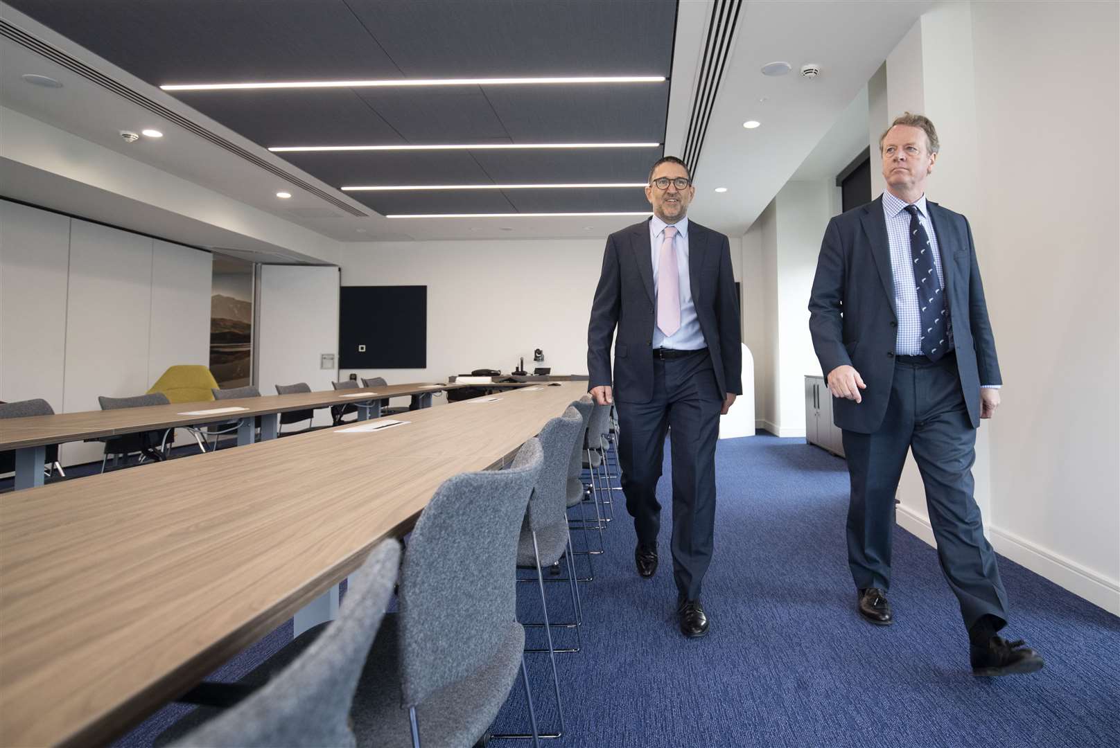 Alister Jack (right) with director of locations programme for HMRC Colin Cassel inside the new Cabinet Room at Queen Elizabeth House (jane Barlow/PA)