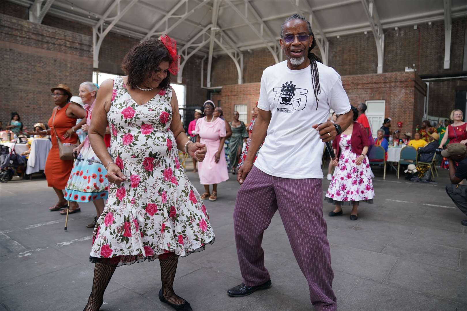 The event was held on the docks where the first Windrush passengers arrived (Lucy North/PA)