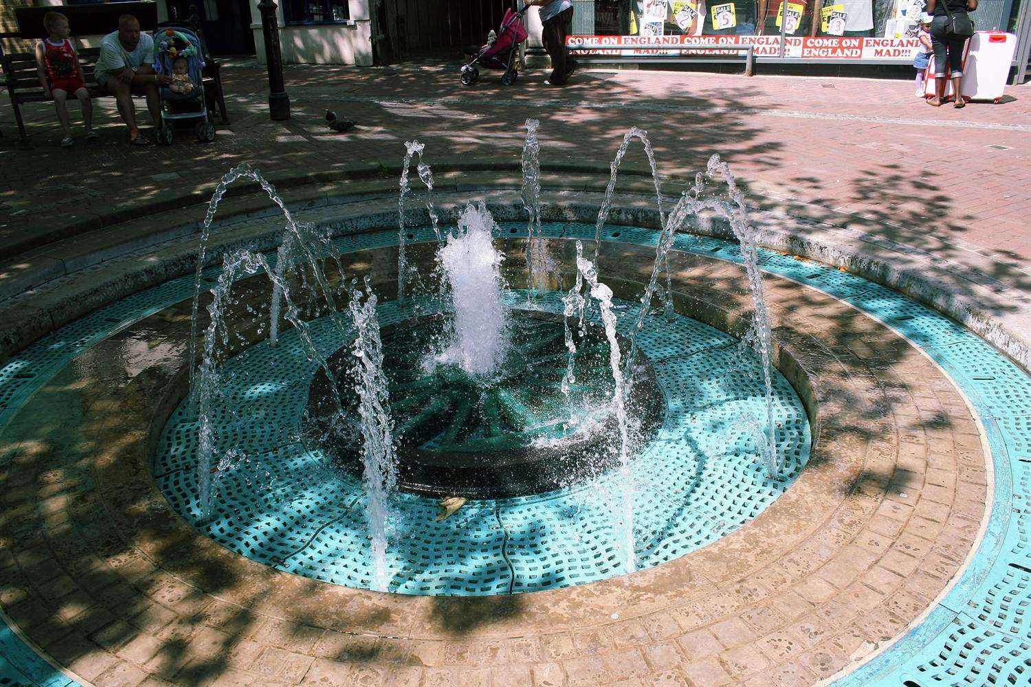 The stabbing happened near the fountain in Ashford High Street