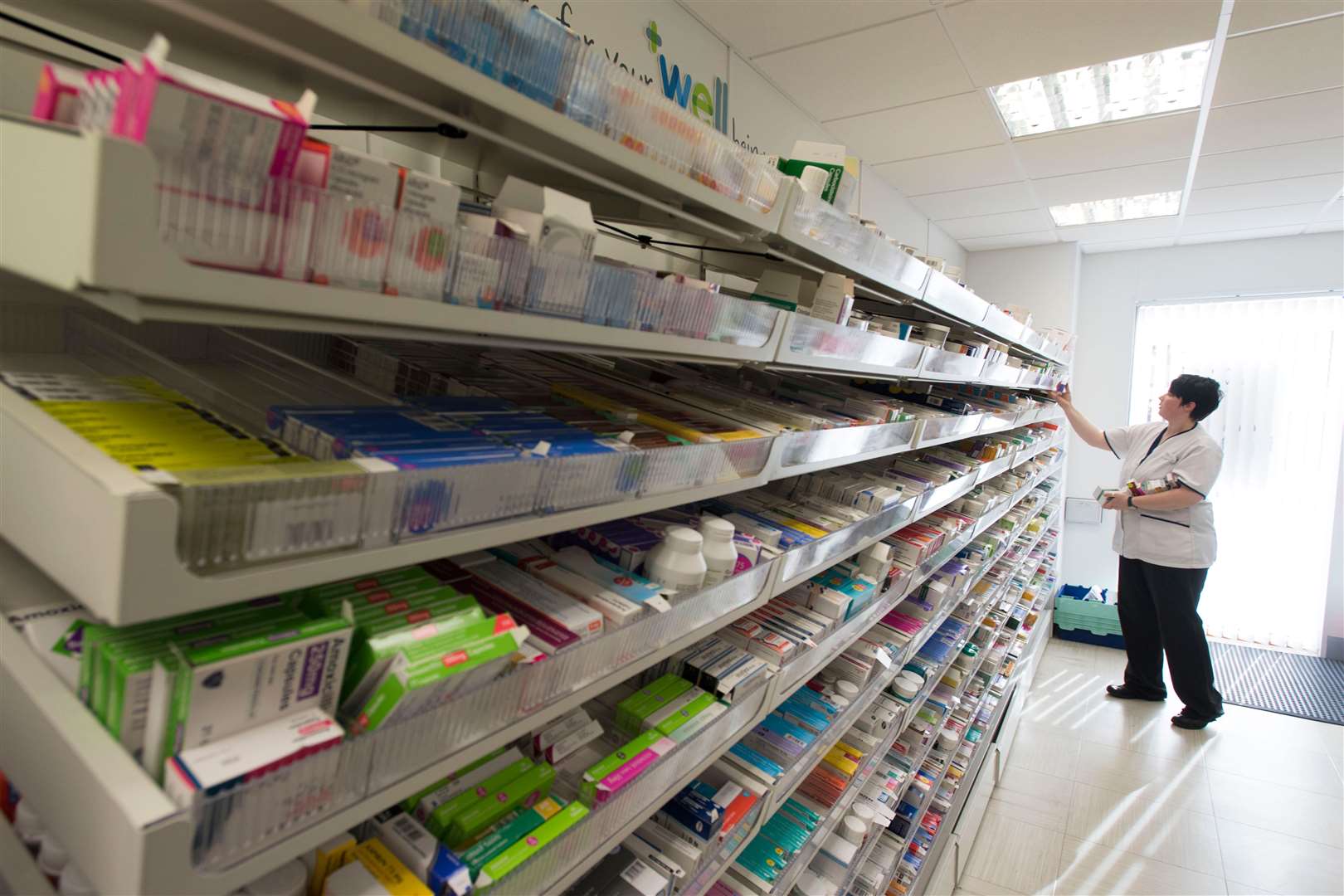 A pharmacist at work in a chemist (Alamy/PA)