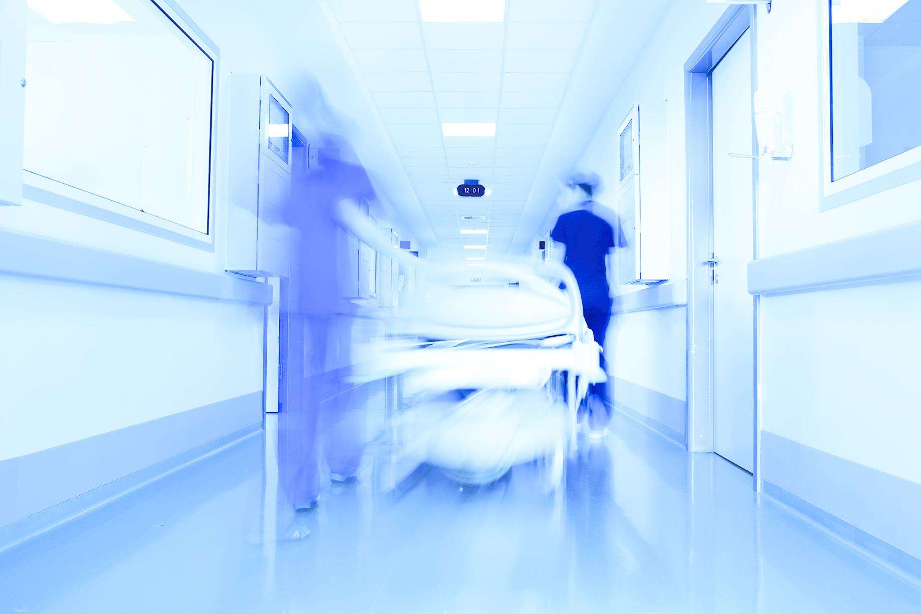 Bed in a modern clinic corridor