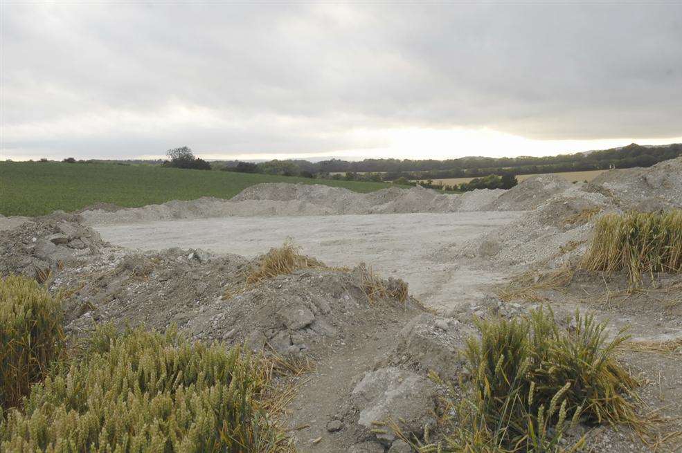 The remains of the excavation of a Bronze Age barrow on the border of Harrietsham and Hollingbourne