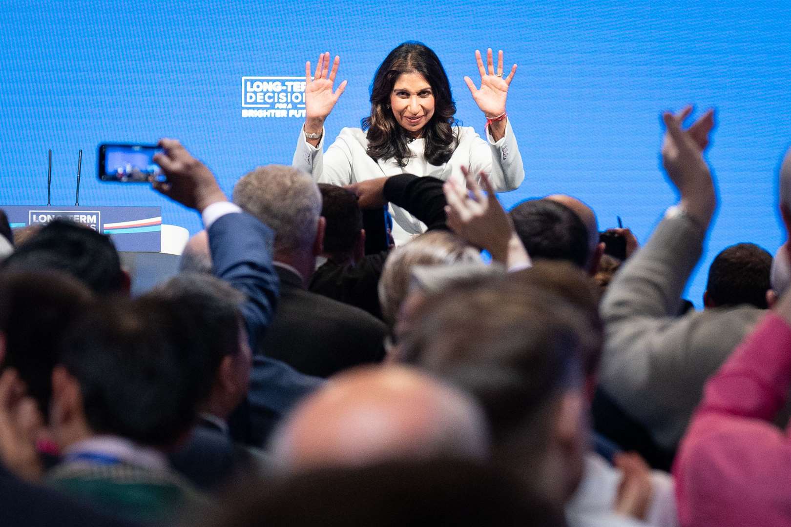 Home Secretary Suella Braverman is applauded after delivering her keynote speech (Stefan Rousseau/PA)