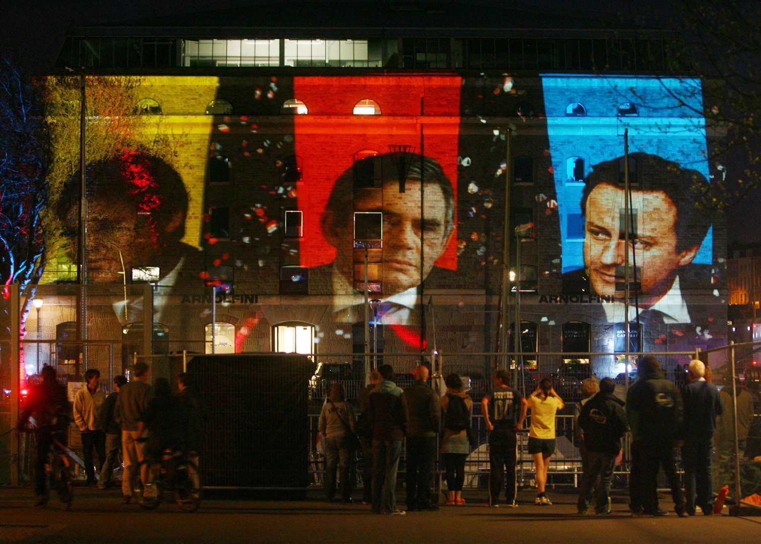 The three leaders in 2010, projected onto the studios where Sky filmed the second televised leaders’ debate in Bristol (Johnny Green/PA)