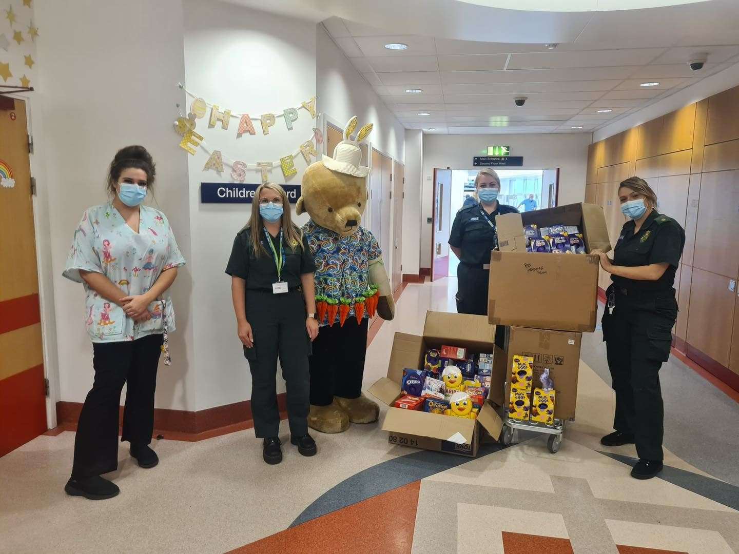 Boxes of Easter eggs being delivered to the children’s ward at Russells Hall Hospital in Dudley (West Midlands Ambulance Service/PA)