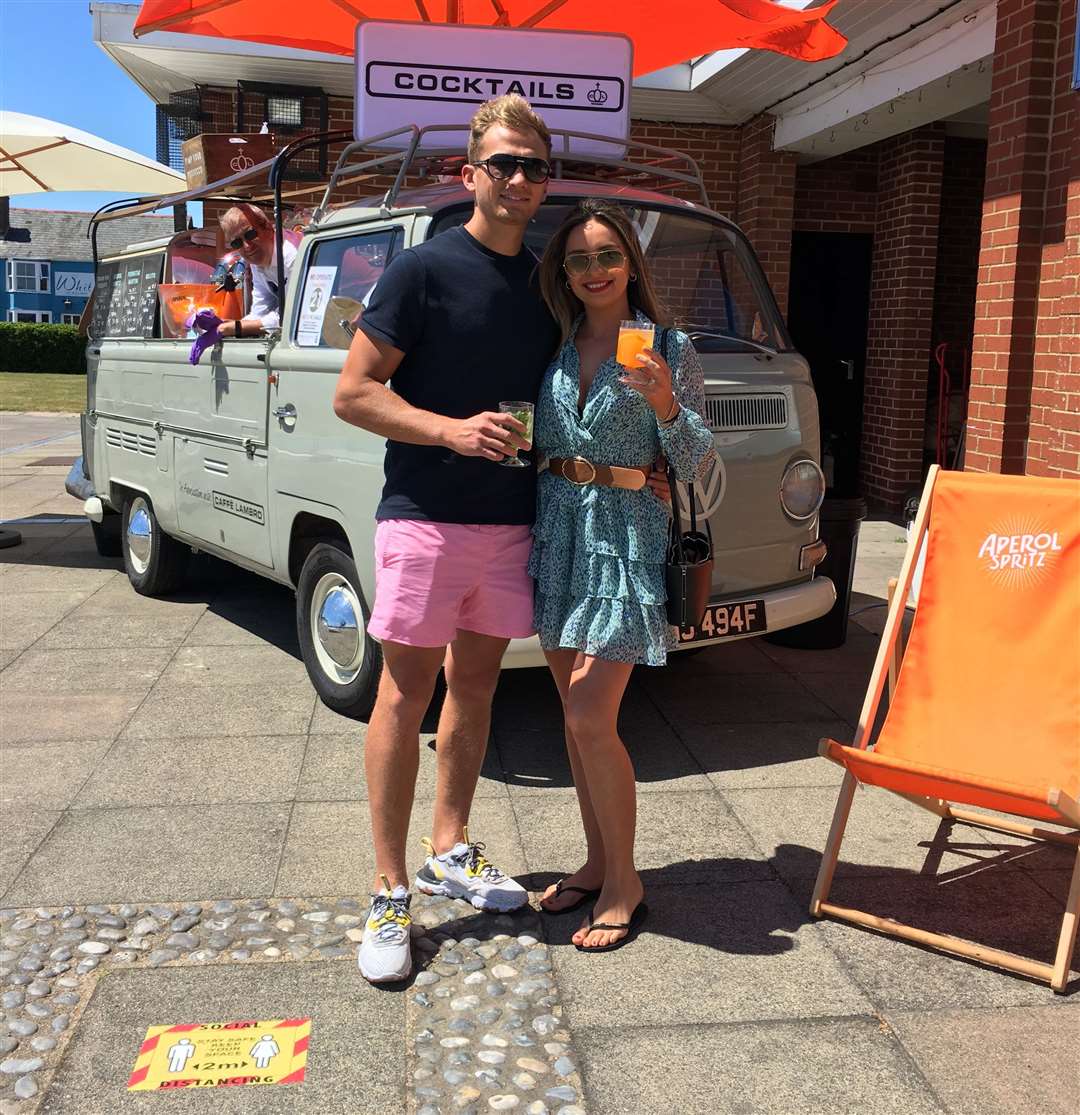 Passers by enjoy a take away drink from the prosecco bar Picture: Caffe Lambro