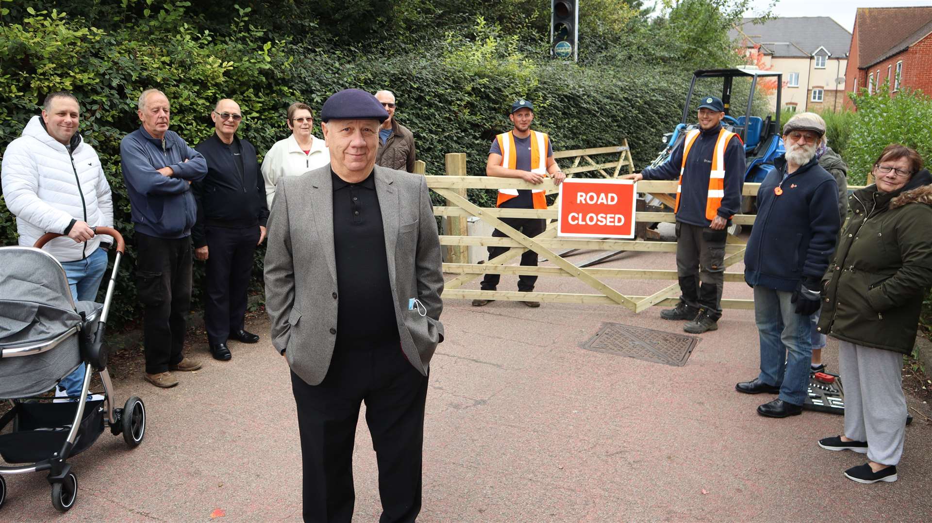 Cllr James Hall and residents at the entrance to the bus lane at Murston