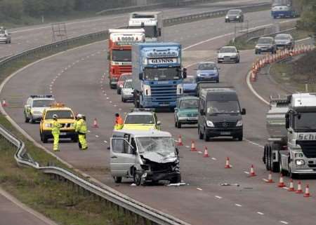 The damaged minibus and central reservation. Picture: Gary Browne