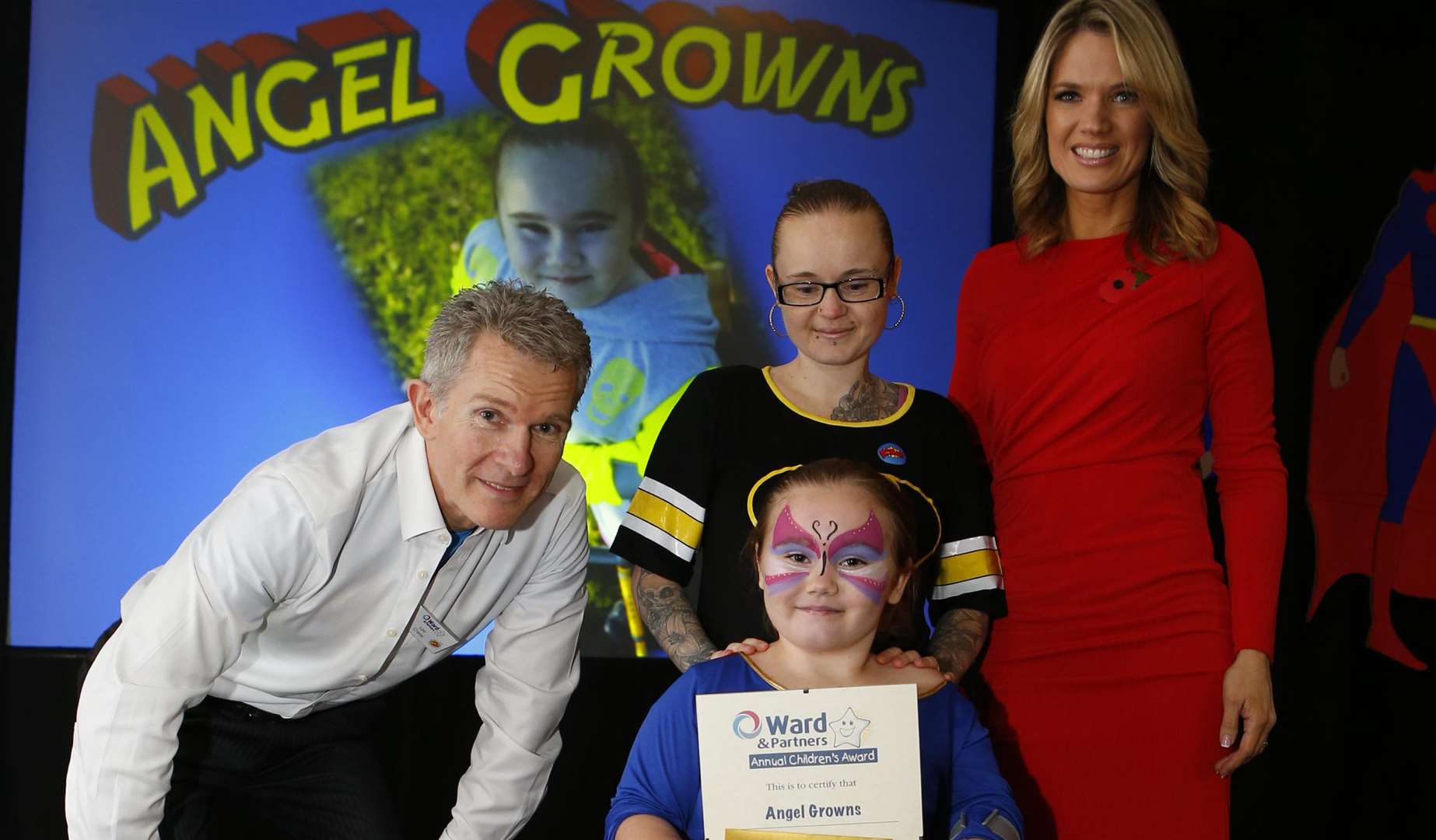 Charlotte Hawkins presents Angel Gowns with her Triumph Over Adversity for children aged 6-16 award. Picture by Andy Jones