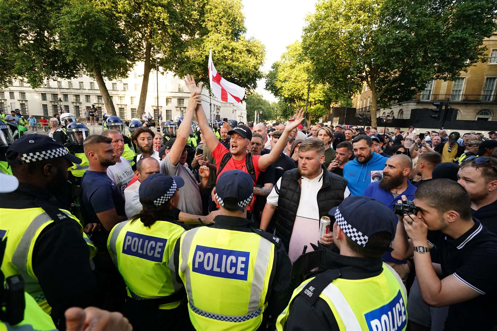 People attending the protest in Whitehall (Jordan Pettitt/PA)