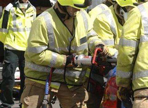 Crews cut someone free. Stock picture