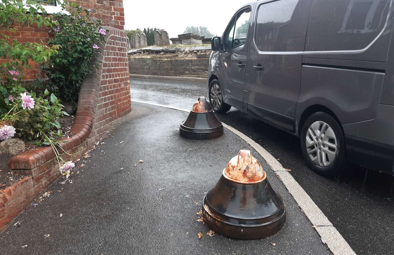 The bollards that are in place on Church Road to protect houses from vehicles