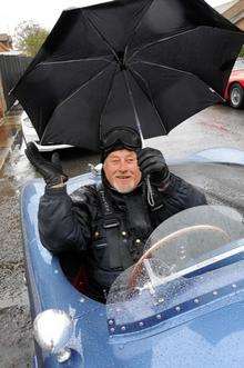 Peter Craker braving the elements in his C Type Replica Jaguar