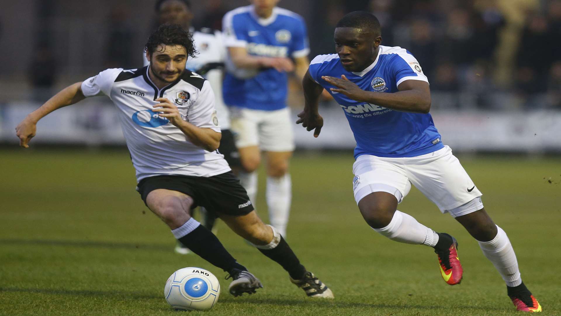 Dartford's Alex Brown battles Dover's Moses Emmanuel in the Kent derby at Princes Park Picture: Andy Jones