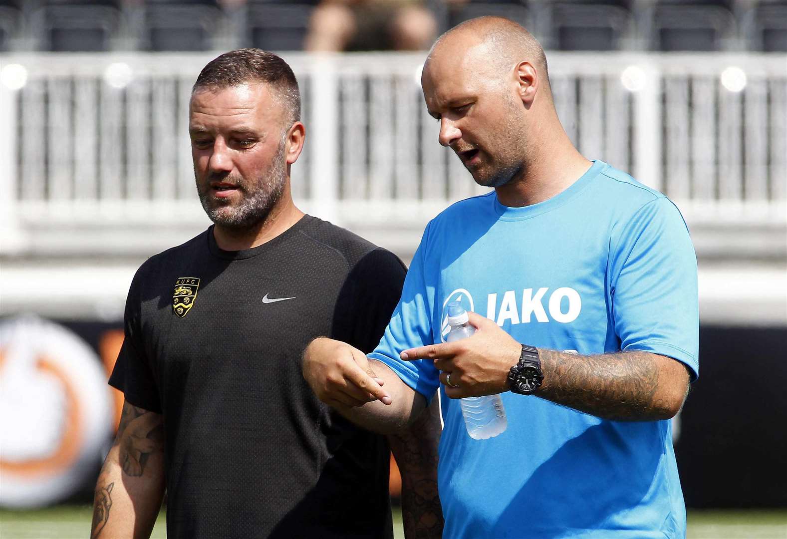 Steve Watt with Maidstone manager Jay Saunders Picture: Sean Aidan